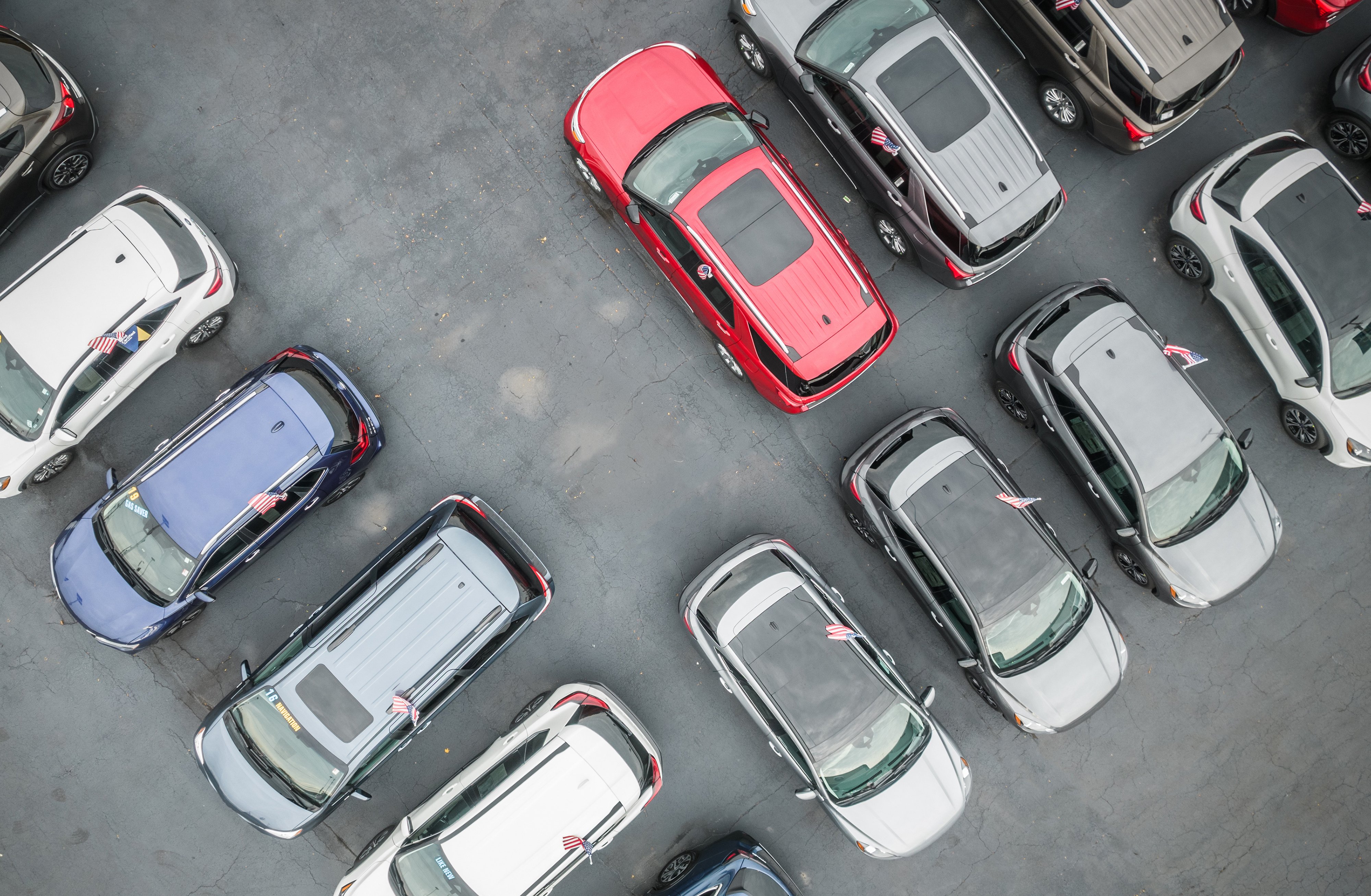 Car Dealership Lot with Vehicle for Sale